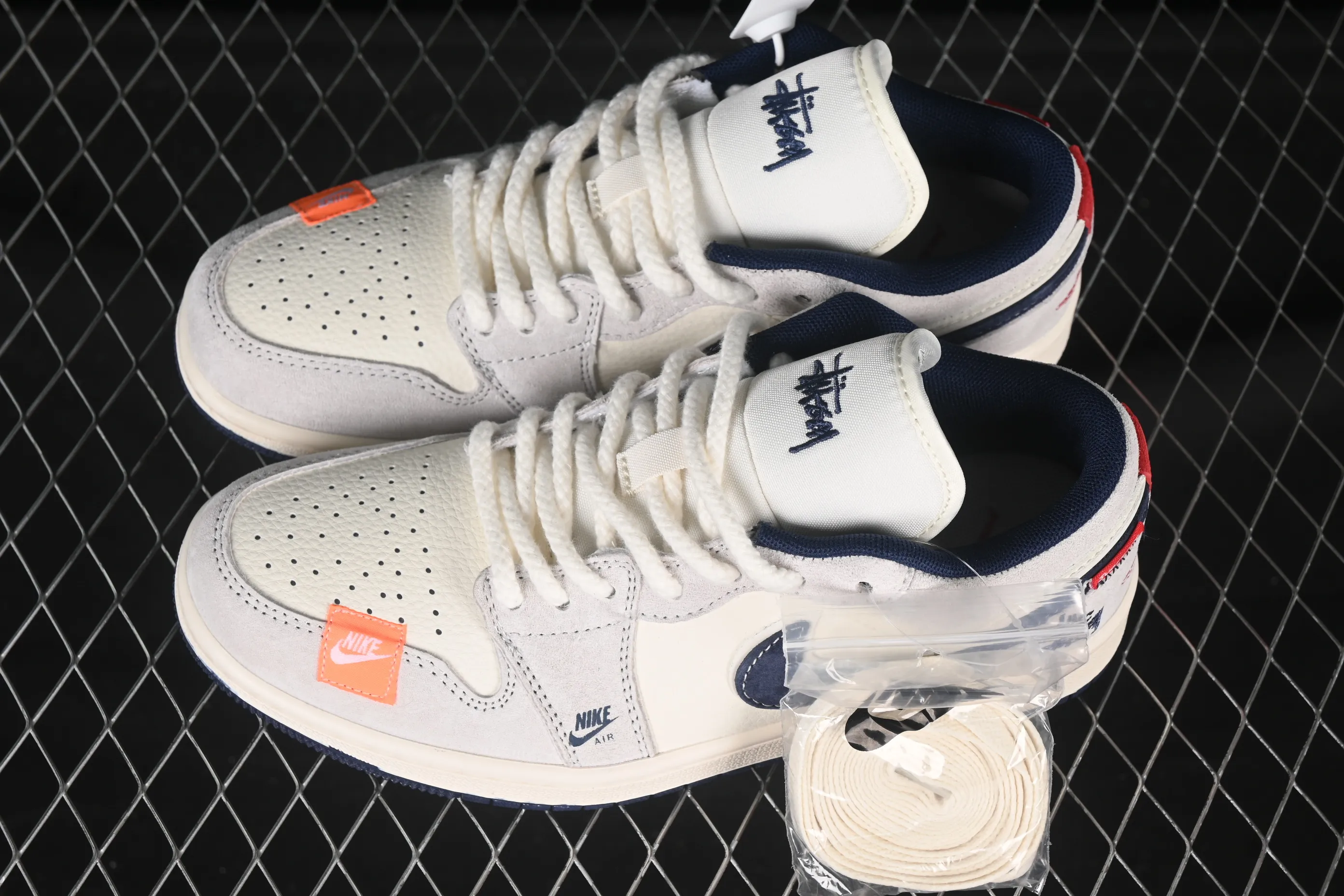 All categories Air Jordan Jordan series basketball shoes Air Jordan 1 Low high-end customized low-top sneakers Air Jordan 1 Low AJ1 Joe 1 Stussy joint pig eight dark blue hook high-end customized low-top retro basketball shoes YX5066-303